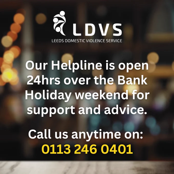Blurry image of lights in background with text overlay that reads Our Helpline is open 24hrs over the Bank Holiday weekend for support and advice. Call us anytime on 0113 246 0401.