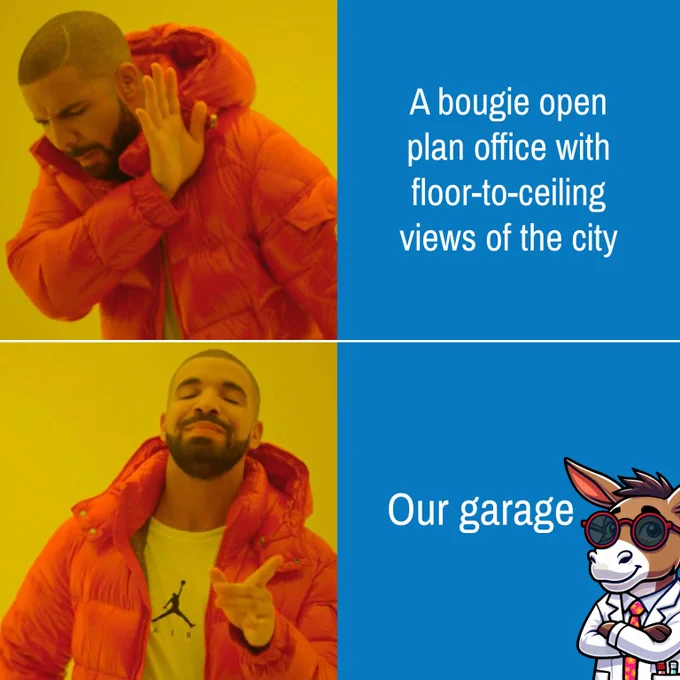Drake (the singer/rapper) shuns “A bougie open plan office with floor-to-ceiling views of the city” for “Our garage”. This image is a version of the Drake Hotline Bling meme.