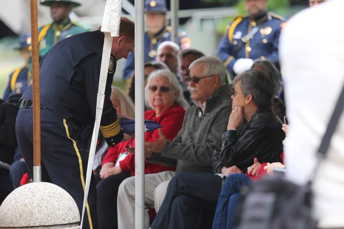 Chief presents flag