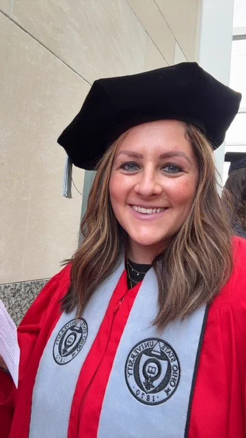 Dr. Ali Williams in her regalia at her graduation.