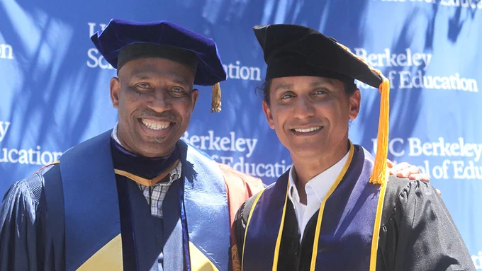distinguished professor frank worrell on the left and doctoral graduate lieutenant darryl diptee on the right both are smiling at the camera 