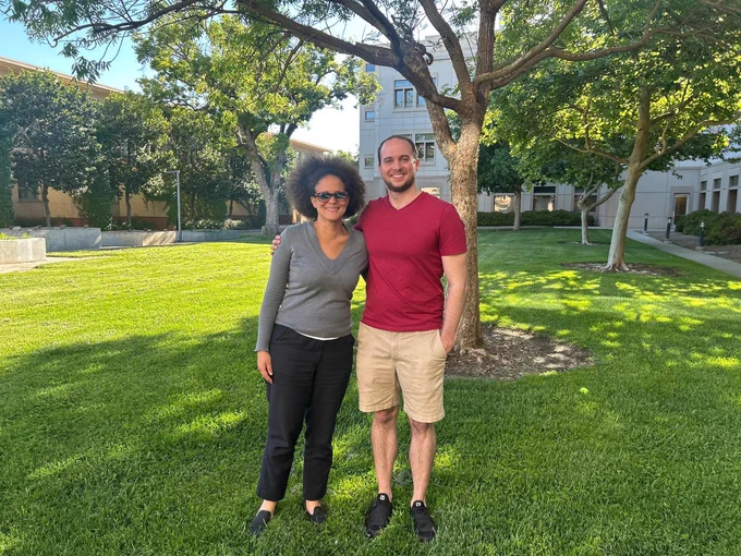 Gaitan and his advisor Dr. Peña together in the PES courtyard.