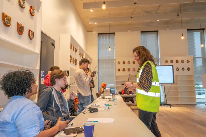 Last year's event with students trying out walkie talkies
