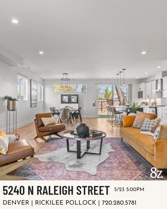 Interior of a modern house at 5240 N Raleigh Street, Denver, featuring a spacious living area with stylish furniture and large windows.