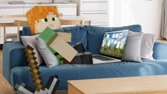 Alex playing Minecraft Solitaire on a computer
