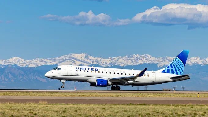 A United Express jet lands at DEN.
