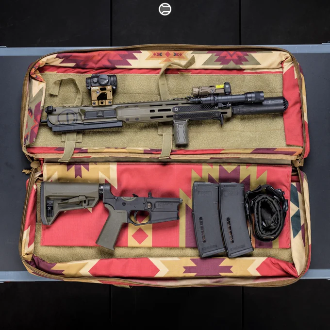 RailScales QTR Stop, RSBM-P M-LOK VFG, 1.5-Slot Matrix Black FR4 G10 Solo's M-LOK Scale, 3-Slot Matrix Black FR4 G10 RailScales M-LOK Scales, QDX M-LOK Sling Mount, Ampule RDS Tool, Halftop Mount for Scout Light Pro Lights, CSMR Mag Button | 11.5" 5.56 CK-Pro Cobalt Kinetics / Kinetic Consulting Bear Claw Rifle, HUXWRX Flow 556K Suppressor, Surefire M640V-Pro IR Light w/ DS00 Switch & CSM-07 Pressure Pad, EOTech OGL Laser, Aimpoint Micro T-2 Red Dot w/ Unity Tactical Fast Micro FDE Mount, Magpul MOE-SL Grip & SL-M Stock in OD Green, Magpul 30rd EMAG's, Ferro Concepts Slingster w/ Blue Force Gear ULoop Attachments, SupDef x WRMFZY Southwest Auto Bag. 