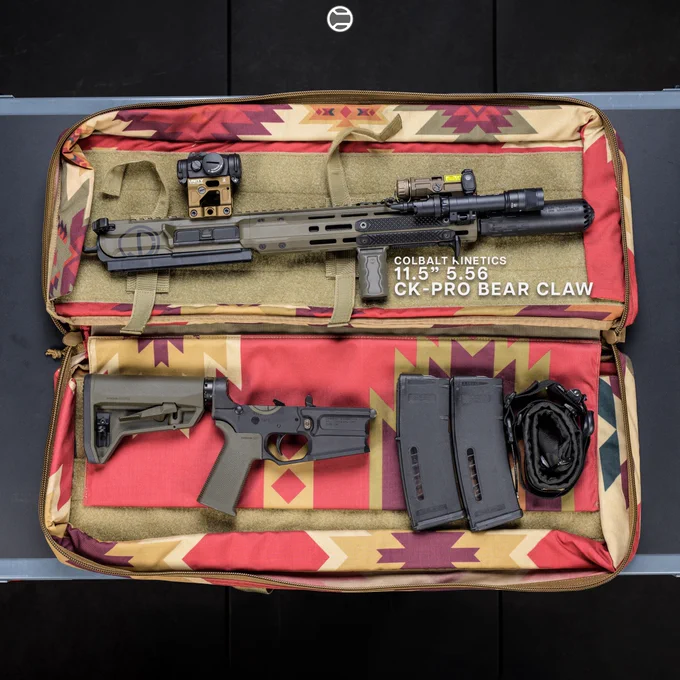 RailScales QTR Stop, RSBM-P M-LOK VFG, 1.5-Slot Matrix Black FR4 G10 Solo's M-LOK Scale, 3-Slot Matrix Black FR4 G10 RailScales M-LOK Scales, QDX M-LOK Sling Mount, Ampule RDS Tool, Halftop Mount for Scout Light Pro Lights, CSMR Mag Button | 11.5" 5.56 CK-Pro Cobalt Kinetics / Kinetic Consulting Bear Claw Rifle, HUXWRX Flow 556K Suppressor, Surefire M640V-Pro IR Light w/ DS00 Switch & CSM-07 Pressure Pad, EOTech OGL Laser, Aimpoint Micro T-2 Red Dot w/ Unity Tactical Fast Micro FDE Mount, Magpul MOE-SL Grip & SL-M Stock in OD Green, Magpul 30rd EMAG's, Ferro Concepts Slingster w/ Blue Force Gear ULoop Attachments, SupDef x WRMFZY Southwest Auto Bag. 