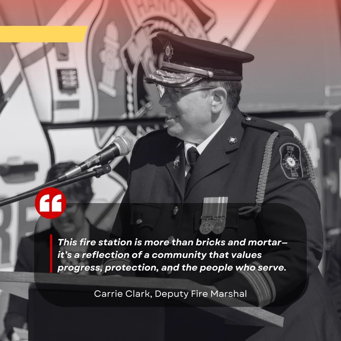 Deputy Fire Marshal Carrie Clark delivers a speech at a fire station, standing at a podium with a fire department insignia. Image includes a text overlay quoting Carrie Clark about the values of the community in relation to the fire station.