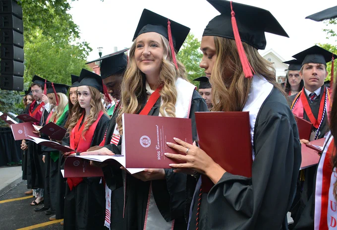 graduating seniors with programs