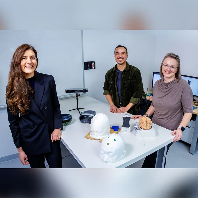 IMAGE: Group portrait of the research team from Concordia University's Gina Cody School of Engineering and Computer Science mentioned in the article: Marta Kersten-Oertel, right, with Zahra Asadi and Joshua Pardillo Castillo. They are in a lab room, posing with the iSurgARy equipment.