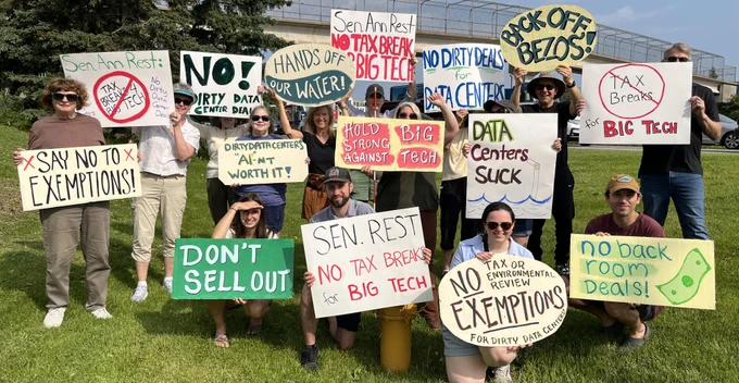 Group - signs such as "No exemptions for dirty data centers"