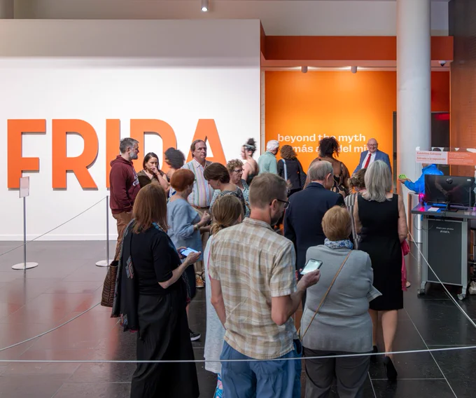 A group of people queueing for VMFA's special exhibition "Frida: Beyond the Myth."