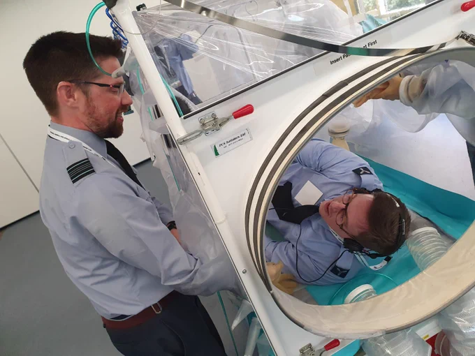 RAF Medical Reserve practicing skills with mock patient.