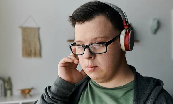 Young man wearing headphones.