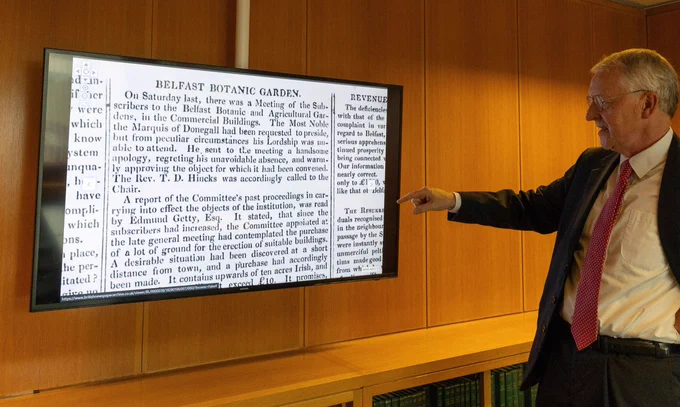 Secretary of State Hilary Benn views newly digitised historic editions of the News Letter during a visit to the British Library in London.