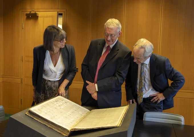 Secretary of State Hilary Benn views newly digitised historic editions of the News Letter during a visit to the British Library in London, accompanied by British Library Chief Executive Rebecca Lawrence and Richard Hall, DC Thomson Deputy Chair.