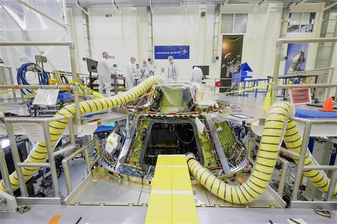 Technicians work on Artemis III Orion crew module on Wednesday, March 5, 2025, at the Neil A. Armstrong Operations and Checkout Building at NASA’s Kennedy Space Center in Florida. Technicians will continue assembling and testing the crew module and service module before integration in 2026.
NASA/Rad Sinyak