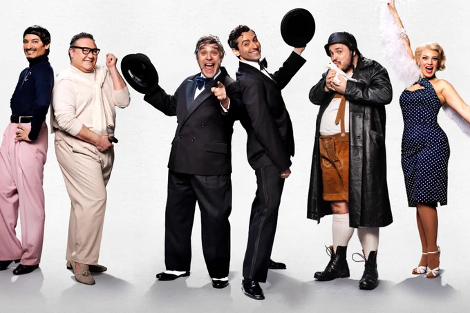 A photo showing six people in vintage outfits 