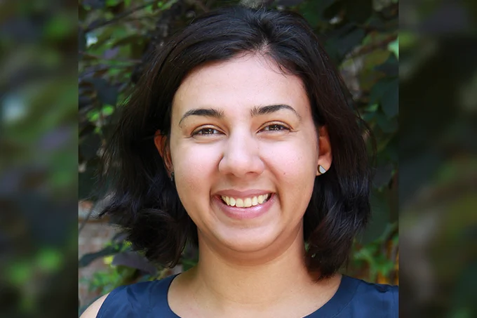 IMAGE: Close-up portrait of Sheila Colla, outside.