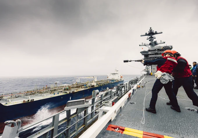 Gunner’s Mate Seaman Emily Nutt, from Pensacola, Florida, assigned to weapons department’s armory division, fires a shot line on the flight deck of the Nimitz-class aircraft carrier USS George Washington (CVN 73) before a fueling-at-sea with the Military Sealift Command-chartered ship motor tanker Badlands Trader while underway in the Pacific Ocean, May 28, 2025. The George Washington is the U.S. Navy’s premier forward-deployed aircraft carrier, a long-standing symbol of the United States’ commitment to maintaining a free and open Indo-Pacific region, while operating alongside allies and partners across the U.S. Navy’s largest numbered fleet. (U.S. Navy photo by Mass Communication Specialist 3rd Class Geoffrey L. Ottinger)
