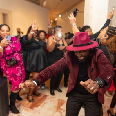 A shot of someone dancing in a crowd at VMFA's Art After Hours event.