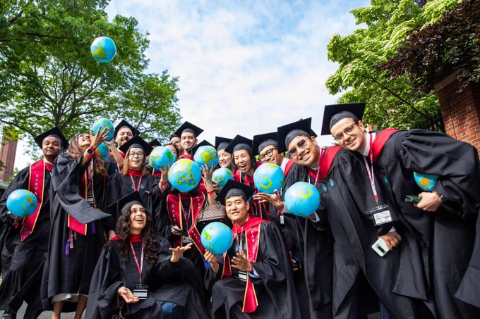 A group of graduates posing for a photo.