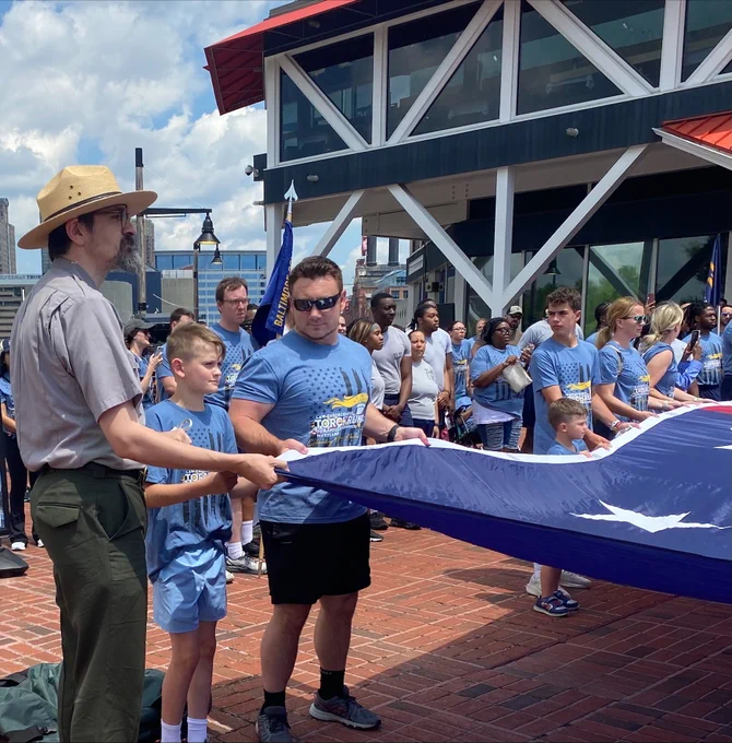 Law enforcement present the American flag to start the festivities. 
