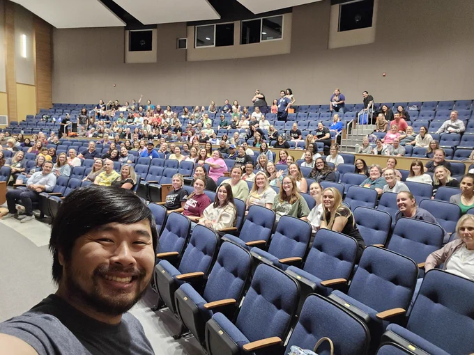 A selfie of me and around several dozen people.