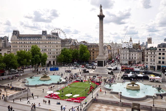 Photo of people playing at the pop up HSBC Championships tennis court in Trafalgar Square