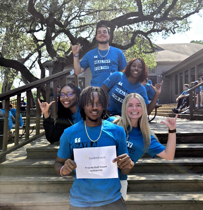 The FGCU The Leadership Experience (TLE) group taking a picture at the John Newcombe Ranch in New Braunfels, TX, at the start on Day 2 of LeaderShape.