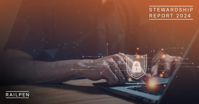 Person on laptop with cybersecurity graphic on top.