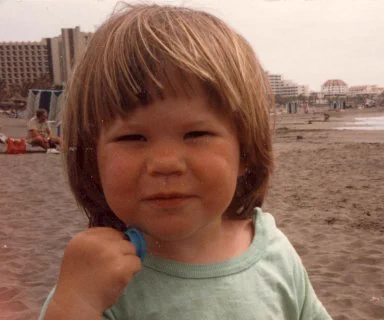 photo of a baby on a beach