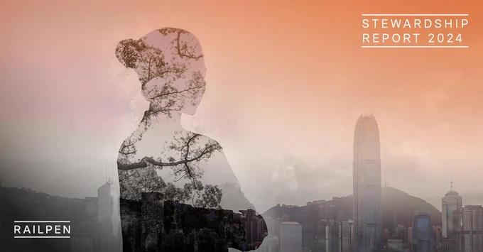 Shadow of woman looking to city skyline.