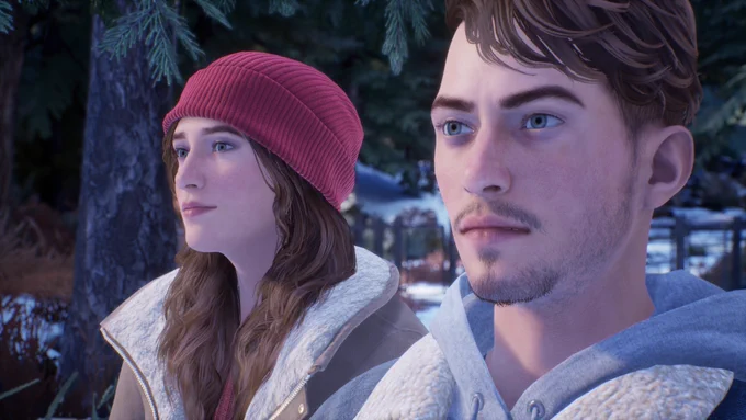 A pair of twins – a young woman wearing a red hat and a young man in a denim jacket – standing side by side in a snowy forest.