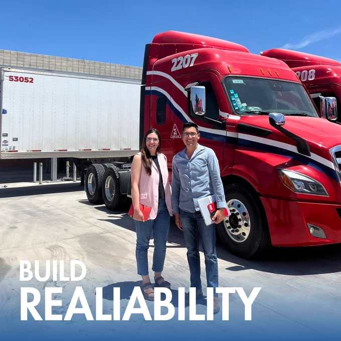 C.A.T. Global SATX team members standing in front of well-maintained red trucks, reinforcing the importance of onsite visits to ensure carrier reliability and CTPAT compliance.