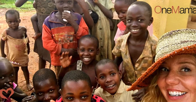 OneMama.org Founder with the community children at the clinic