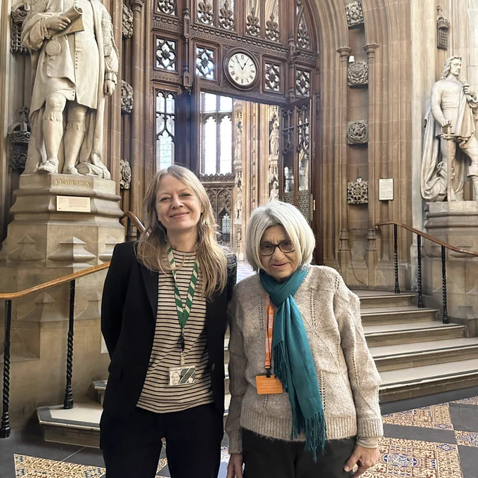 Siân is stood next to Laila Souief, in parliament after Siân asked the Government to do more to free Alaa.