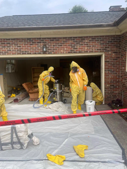 HAZMAT team working to safely remove all traces of mercury from the residence.