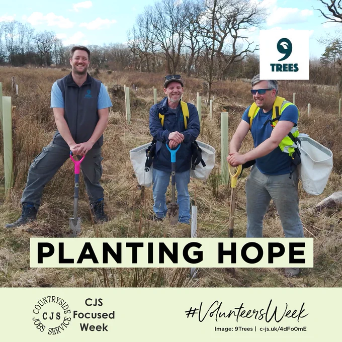 3 smiling people stand in a forest, leaning on spades, next to newly planted trees. Text reads: Planting Hope