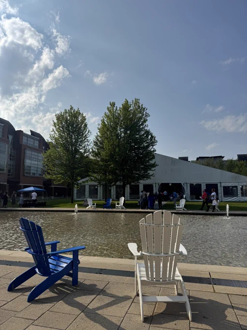 Looking across the reflecting pool at the large tent for convocation