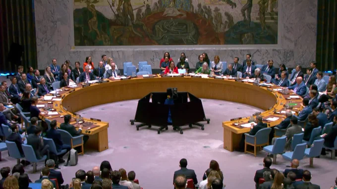 Security Council members vote on the draft resolution.