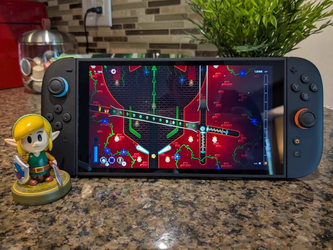 Photo of Pinball Spire on a Switch 2. There's a Link amiibo next to it.