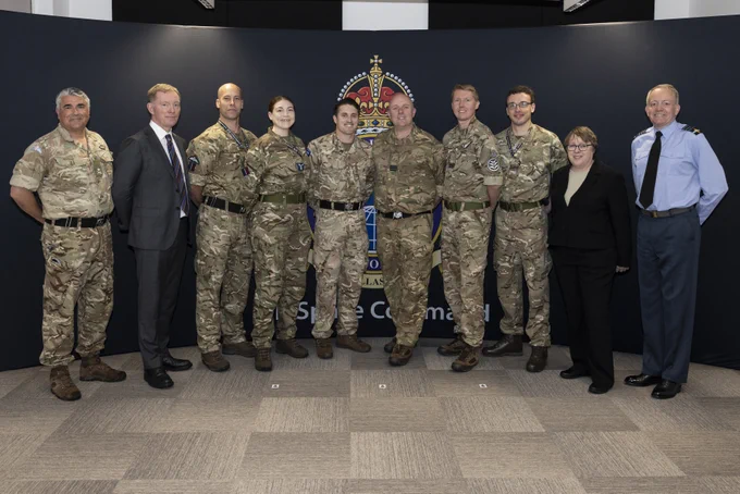 8 Military personnel, including Air Chief Marshal Sir Rich Knighton and Major General Paul Tedman, with Rt Hon Maria Eagle MP and Sir Chris Bryant MP.