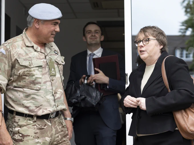 Major General Paul Tedman meeting Rt Hon Maria Eagle MP at entrance of Space Command. 