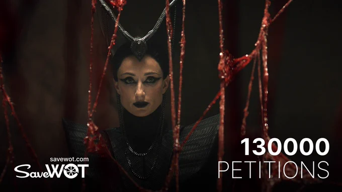 Natasha O'Keeffe as Lanfear in The Wheel of Time, framed by red threads of Sammael's remains. She wears a dark, elaborate costume with sharp shoulders and a crown-like headpiece, staring intensely forward. The text on the image reads “savewot.com SaveWOT” and “130000 PETITIONS.”