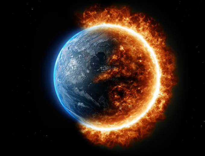 An image of the earth against black sky, fire engulfing the right side.