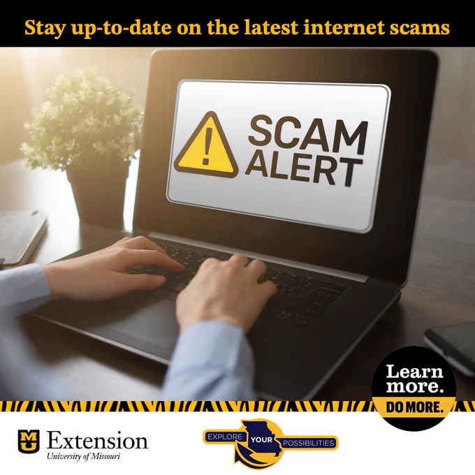 A laptop screen with a "Scam Alert" message displayed. Text says "Stay up-to-date on the latest internet scams."