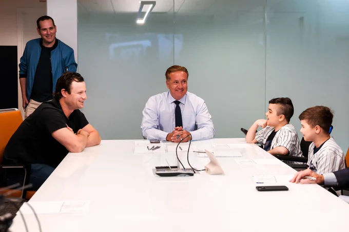 Gerrit Cole talks to Carmine and Vincent Gagliano at the YES Network Studios during a pregame production meeting. 