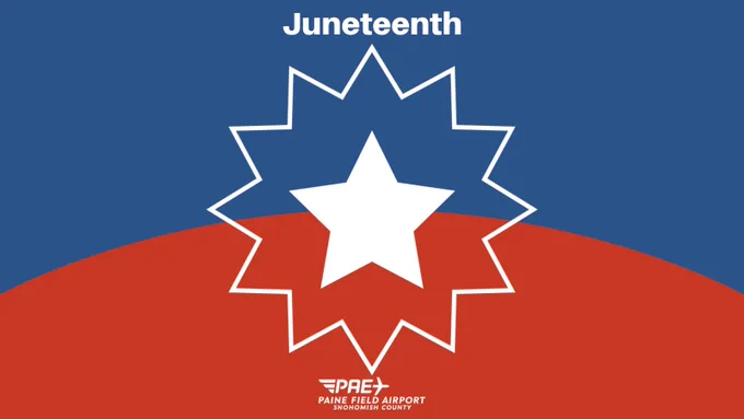 The Juneteenth flag featuring a bursting white star in the center surrounded by a blue and red field, representing freedom, hope, resilience and the end of slavery. The word Juneteenth appears above the bursting white star, while the official logo of Paine Field appears at the bottom.